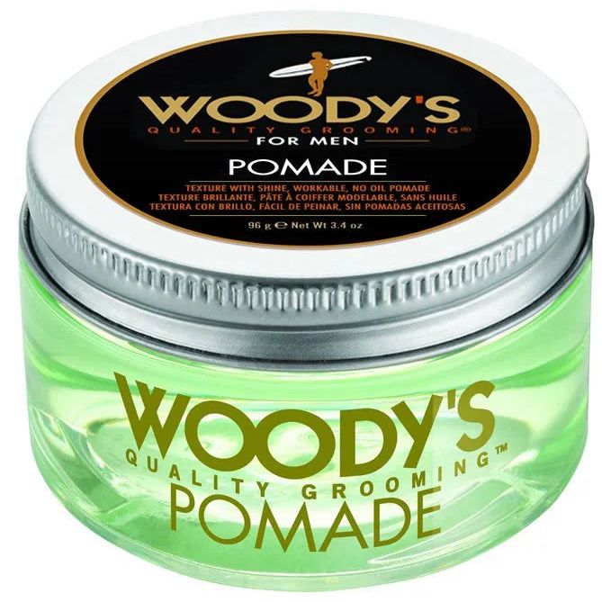 Green Woody's Pomade 3.4 fl oz jar with silver lid